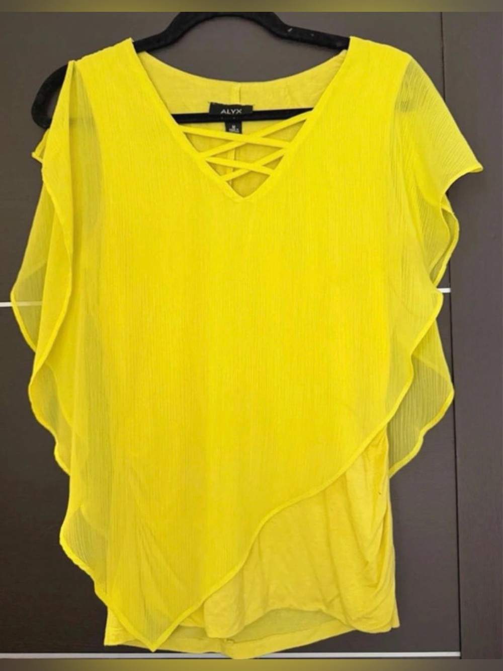Bright yellow flutter sleeve blouse